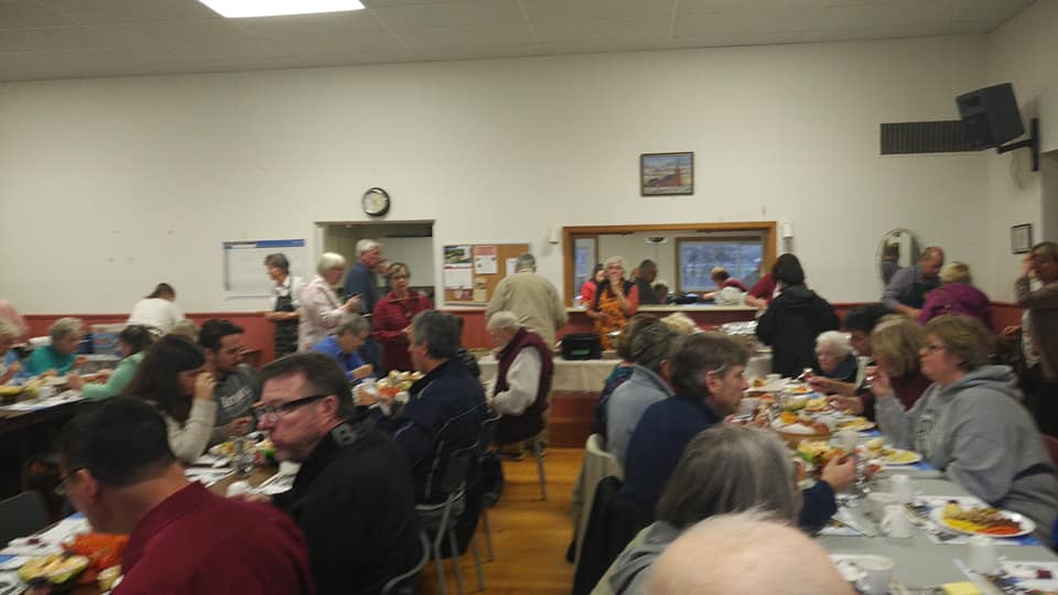Congregation members worshipping together at Cherryfield Baptist Church